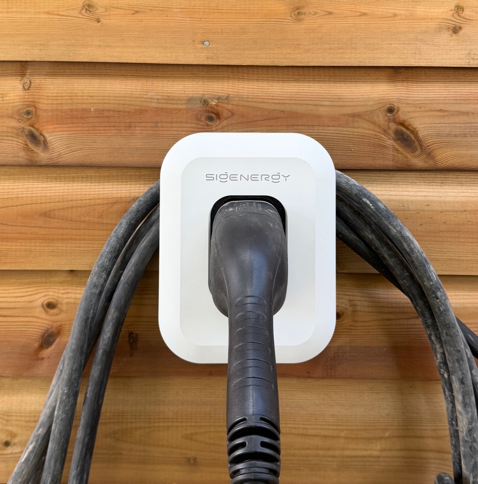 The 25kW Sigenergy DC charger — sized so the cars' own batteries can feed back into the home during an outage.