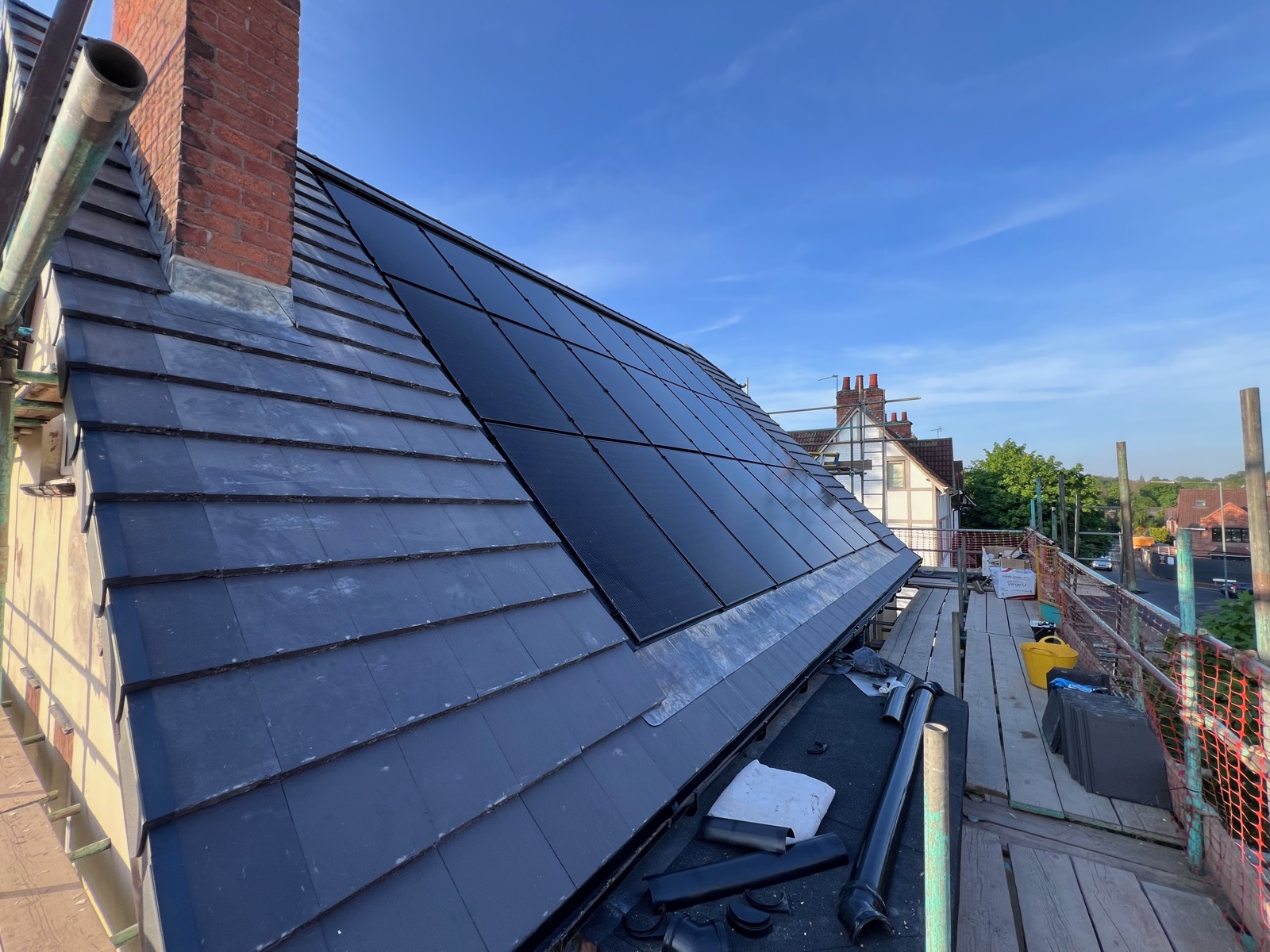 The finished in-roof array — panels integrated flush into the roof for a sleek, low-profile result.